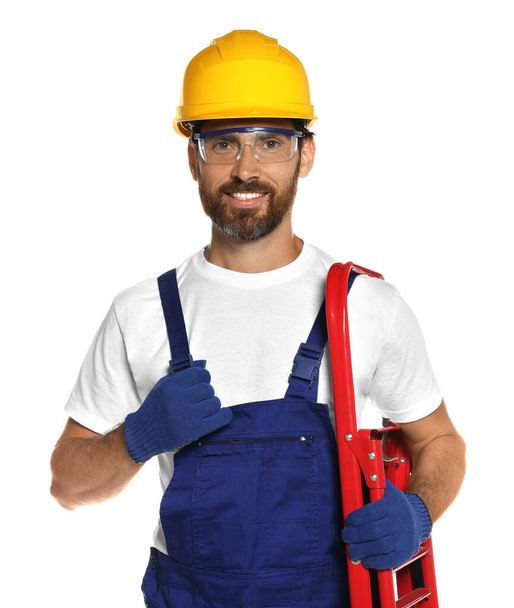 Professional builder in uniform with step ladder isolated on white - Valokuva, kuva