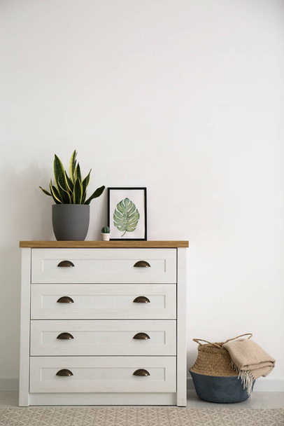 Stylish chest of drawers in living room interior - Fotografie, Obrázek