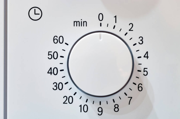 Microwave oven circular timer for one hour, analogue white - Zdjęcie, obraz