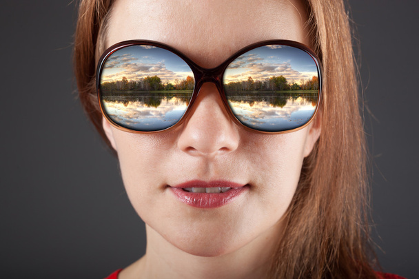 amazed girl in sunglasses with reflection - Photo, Image
