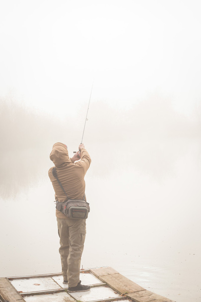 Fisherman with spinning - Fotó, kép