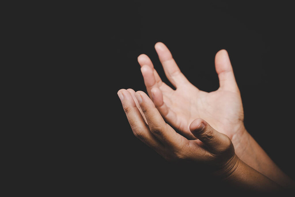 Close up Asian christian woman hands person pray and worship for thank god in church with black background, The concept for faith, spirituality and religion - Foto, Imagem