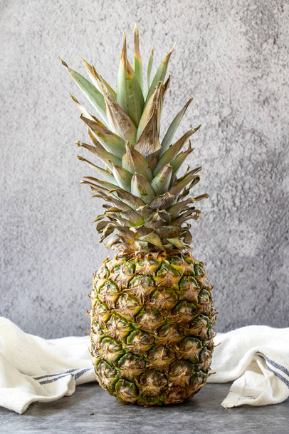 Pineapple on dark background. Fresh and juicy pineapple. Organic food. close up - Foto, Bild