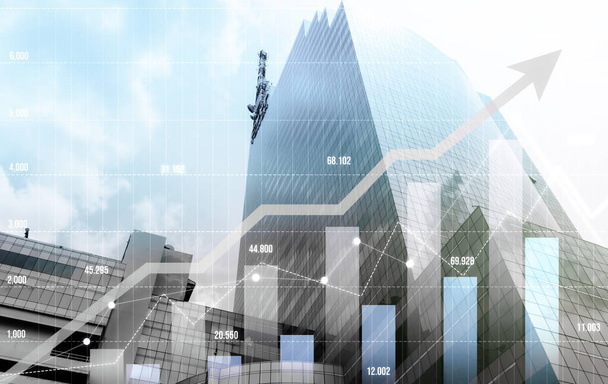 Financial graphs and digital indicators overlap with modernistic urban area, skyscrabber for stock market business concept. Double exposure. - Photo, image