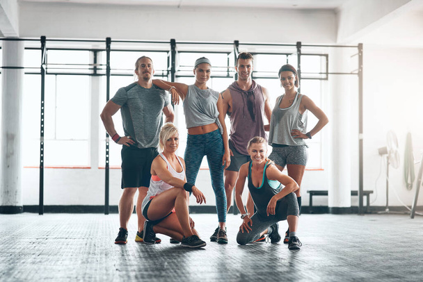 Never stop going after your dreams. Portrait of a fitness group standing together - Zdjęcie, obraz
