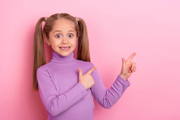 Photo of young charming little girl with no front teeth promote stomatologist services isolated on pink color background. - Фото, зображення