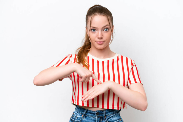 Young caucasian girl isolated on white background making the gesture of being late - Φωτογραφία, εικόνα