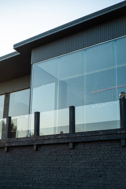 Front view of modern designed concrete residential house - Fotografie, Obrázek