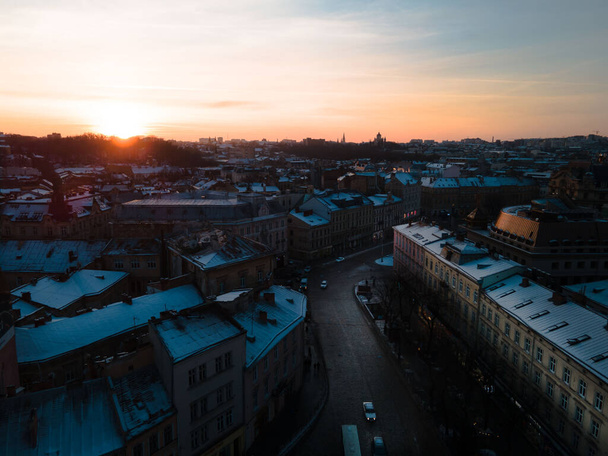sunset above lviv city winter season copy space - 写真・画像