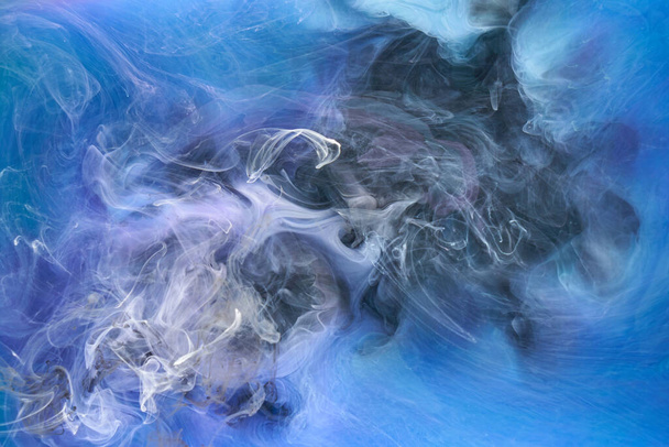 Blue multicolored smoke abstract background, acrylic paint underwater explosion - Foto, afbeelding