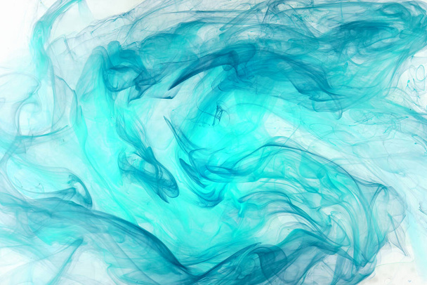 Blue multicolored smoke abstract background, acrylic paint underwater explosion - 写真・画像