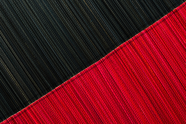 Rosso e nero tappetino di bambù texture o sfondo
 - Foto, immagini