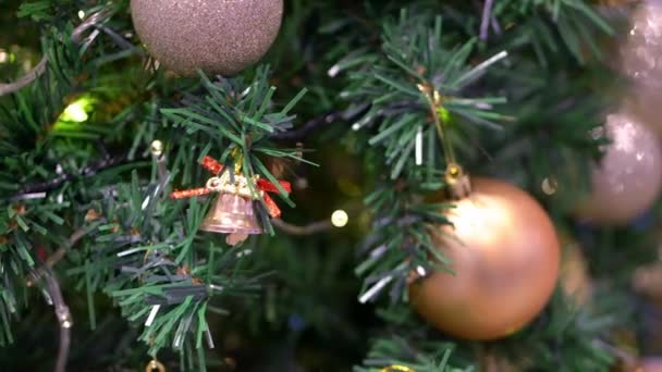 Select focus Christmas bell decoration at tree - Filmagem, Vídeo