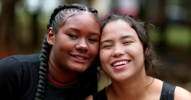 Diverse girlfriends smiling at camera together. Ethnically diversity women - Imágenes, Vídeo