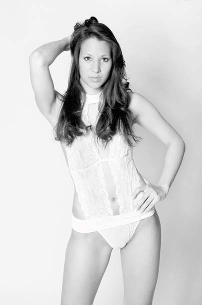 Attractive brunette woman in beautiful white lingerie - Zdjęcie, obraz