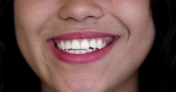 Latina smile. macro close-up hispanic woman lips smiling - Materiał filmowy, wideo