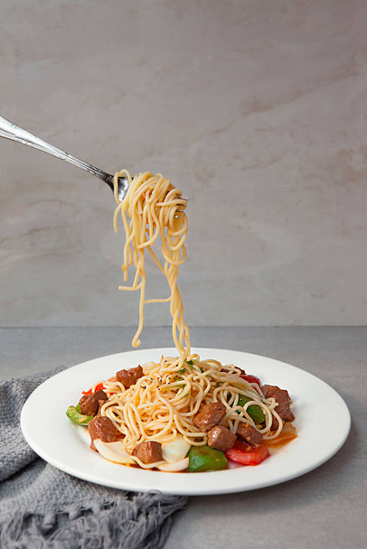 Spaghetti Sauce with Ground Beef, bowls, and plates with food top view  - 写真・画像
