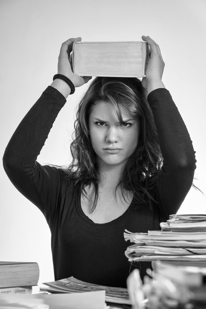 Female student stressed by homework - Foto, Bild