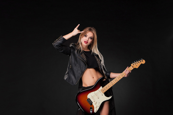 Beautiful girl playing guitar - Фото, изображение