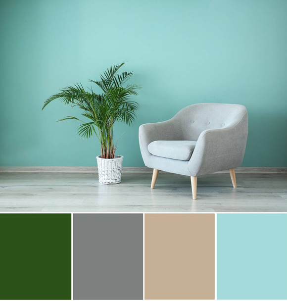 Comfortable armchair and houseplant near turquoise wall in room. Different color patterns - Foto, Bild