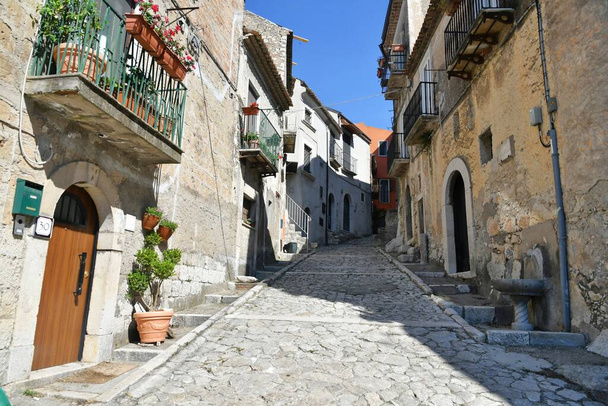 A narrow street between the old houses of Guardia Sanframondi, a village in the province of Benevento, Italy. - Fotografie, Obrázek