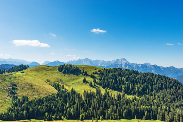 Panoramic view of Carnic and Julian Alps, from the mountain peak of Osternig or Oisternig. Italy Austria border, Europe. Tarvisio, Udine province, Friuli Venezia Giulia.  - Foto, afbeelding