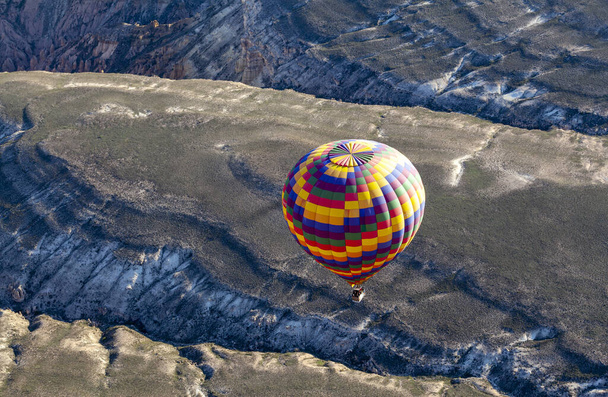 Cappadocia is the region that emerged when the soft layers formed by lava and ashes erupted by Erciyes, Hasanda and Gllda 60 million years ago were eroded by rain and wind over millions of years. - Photo, image