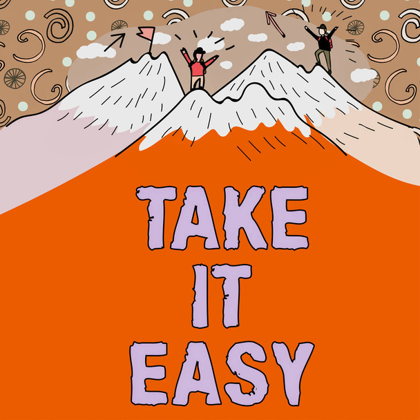 Text sign showing Take It Easy, Business overview Be relaxed do not worry about things stay calmed and rest Message Presented Underneath Men Hiking On Top Of Mountains With Snow. - Photo, image