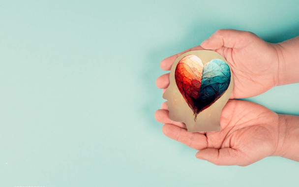 Holding a head with a colorful heart in the hands, symbol of love and positive emotion, charity and support  - Foto, imagen
