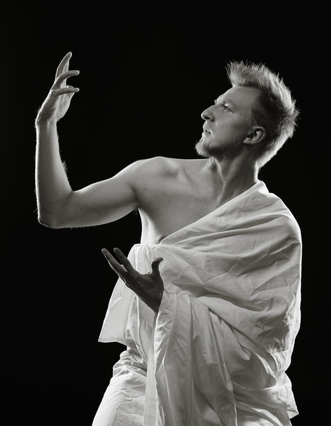 Young man and toga - Foto, afbeelding