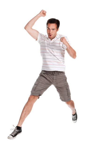 Nuori onnellinen mies hyppää valkoinen
 - Valokuva, kuva