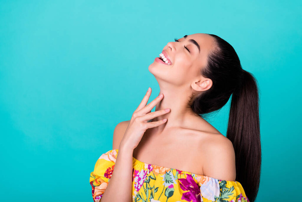 Profile photo of beaurty millennial brunette lady touch skin wear yellow blouse isolated on teal color background. - Valokuva, kuva