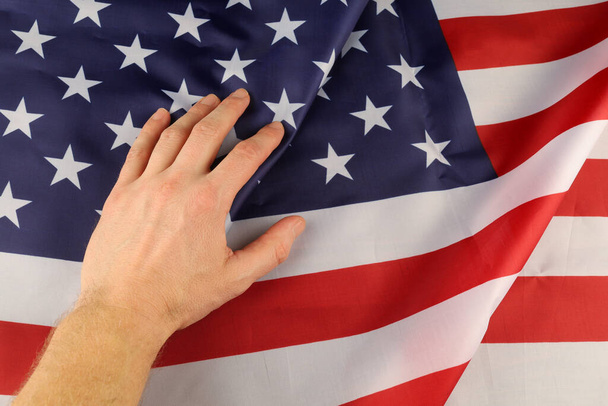 USA silk and hand flag - Valokuva, kuva