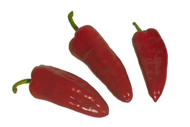 Three Red Romano Peppers isolated on white background. Capsicum annuum - Foto, immagini