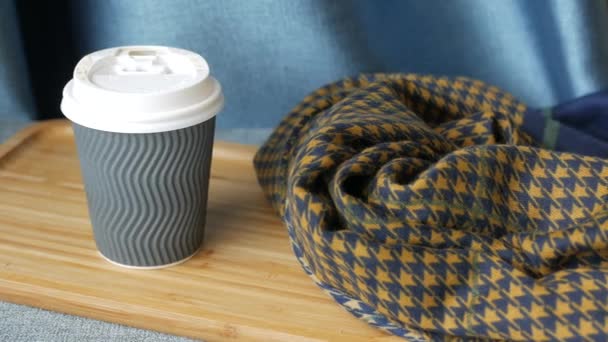 take away paper coffee cup o on cafe table , - Footage, Video