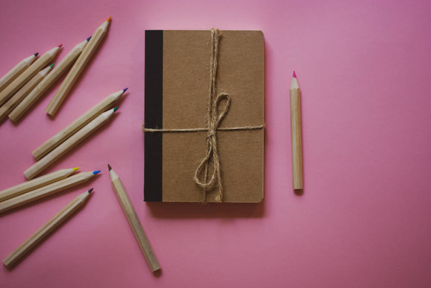  Eco cardboard notepad for notes, tied with sacking rope bow flatly. Wooden pink pencil for journal entries, set of wooden pencils. Feminine secrets. Accessories for studying drawing, female planning. - Fotó, kép