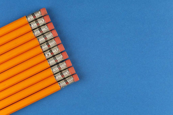There are a lot of pencils with an eraser - Photo, image