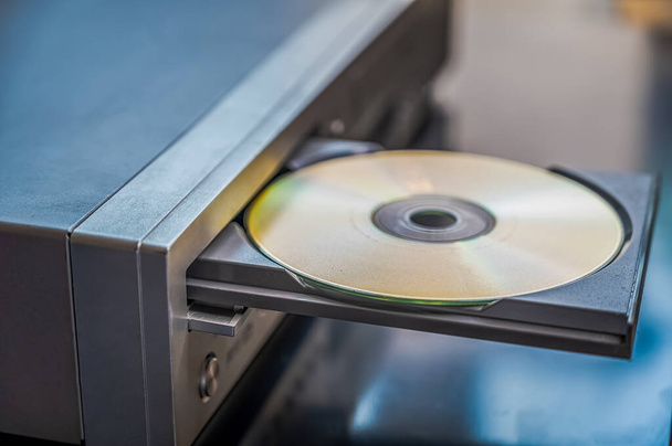 CD and VHS player. playing old CDs, old electrical and electronic devices, old-fashioned media player. - Foto, afbeelding