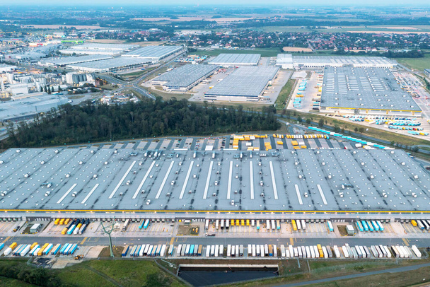 Aerial view of truck loading in logistics warehouse - Foto, afbeelding