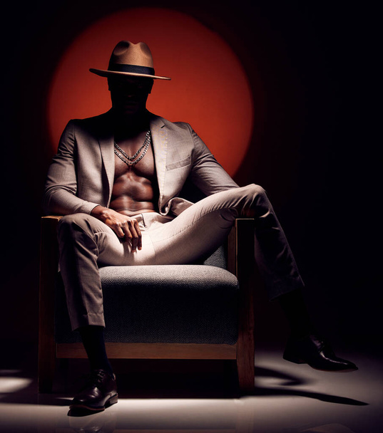Silhouette man, fitness or fashion on studio black, red background light with body skin, strong stomach or abs muscles. Powerful, creative or classy art of healthy model in suit clothes in dark room. - Foto, afbeelding
