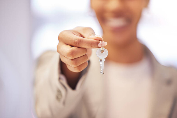 Real estate, realtor and house key in hand for homeowner as mortgage investment, finance loan and future home security. Closeup of broker woman, insurance worker and estate manager in new property. - Foto, Imagen