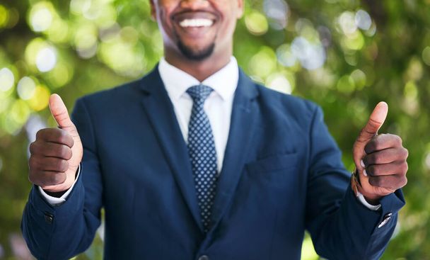 Happy businessman, corporate success and two thumbs up sign. Focus hands of African entrepreneur worker in suit, working professional goal, portrait showing employee support of compliance agreement - Foto, Bild
