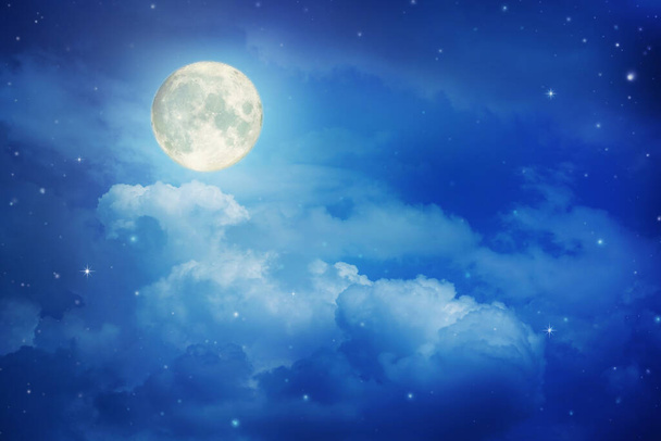 Full moon in night sky with the clouds ,Elements of this image furnished by NASA. - Fotó, kép