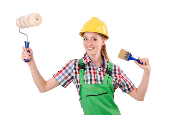 Funny woman painter in construction concept isolated on white - Фото, изображение