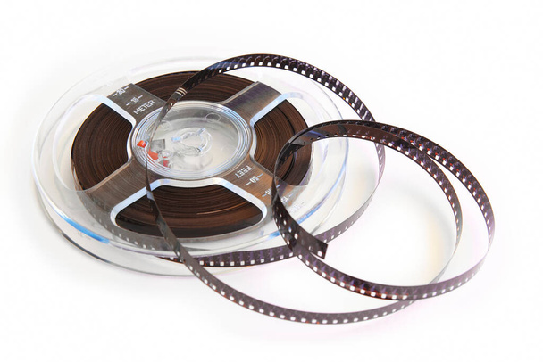 8mm film isolated on white. Vintage movie and filmmaker. Cinema - Zdjęcie, obraz