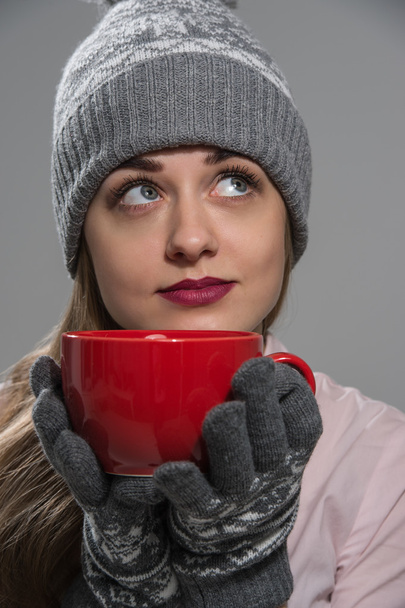 Woman having hot drink - Photo, Image