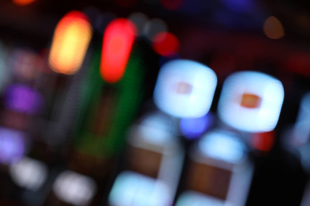 Blurred image of slots machines at the Casino games - Fotografie, Obrázek