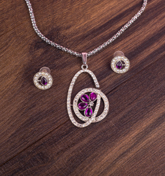 Beautiful jewelry necklace and earrings with precious stones - Photo, Image