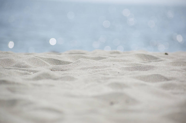 Beach Sand and Sparkling Ocean Background - Fotografie, Obrázek