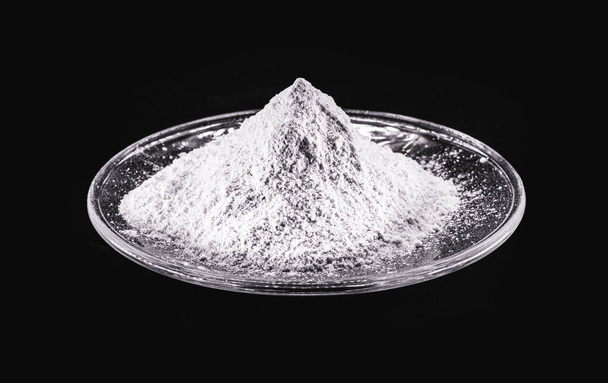 Phosphate, pile of phosphorous powder, used as a fertilizer or compost, for soil correction, or phosphating. Isolated background with copyspace - Foto, afbeelding